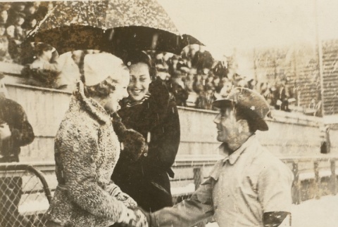 Sonja Henie shaking hands with Ernst Baier (ddr-njpa-1-630)