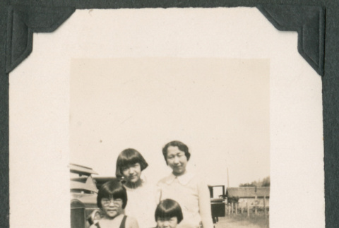 Mary Haruko Ohashi with children in bathing suits (ddr-densho-442-121)