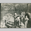 Children running across stone bridge (ddr-densho-523-252)