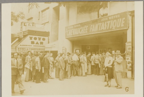 Parisians standing in line outside a movie theater (ddr-njpa-13-1343)