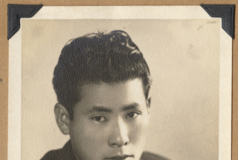 Portrait of a young man in a suit (ddr-densho-542-272)