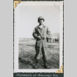Man standing in field (ddr-densho-434-325)