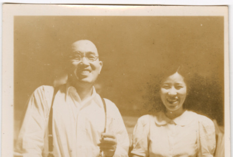 Man and woman standing by table (ddr-densho-426-2122)
