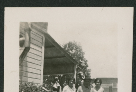 3 people in a garden (ddr-densho-378-824)