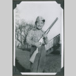 A boy holding a rifle (ddr-densho-201-763)