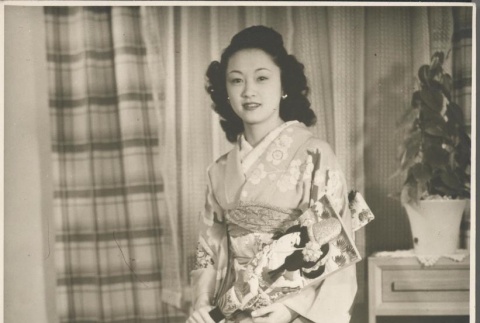 Woman wearing a kimono (ddr-manz-10-148)