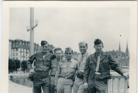 Japanese American and white soldiers on a bridge (ddr-densho-201-41)