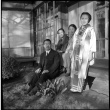 Man and three women outside building (ddr-densho-426-301)