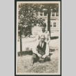 man and woman in a yard (ddr-densho-378-827)
