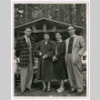 Yasuko Shigaki with 3 others standing by picnic shelter (ddr-densho-456-26)