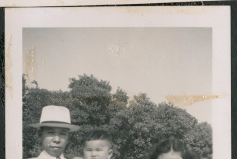 Photo of a family of four (ddr-densho-483-833)