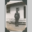 Man standing at attention with rifle (ddr-ajah-2-138)