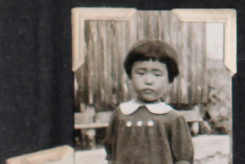 Girl in dress with white collar (ddr-densho-468-463)