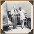Two men outside a building (ddr-densho-542-104)