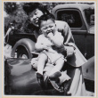Laughing woman holding baby (ddr-densho-522-16)