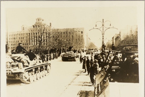 German tanks rolling past saluting soldiers on a Belgrade city street (ddr-njpa-13-895)