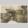 Young child outside house (ddr-densho-383-413)