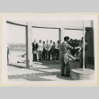 Boy Scouts raise flag at monument (ddr-densho-37-1470)