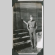 Man in uniform standing outside barracks (ddr-ajah-2-78)