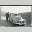 Photograph of B. R. Chamberlain next to his car in Death Valley (ddr-csujad-47-112)