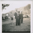 Four people on a lawn (ddr-densho-329-823)