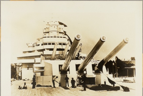 Crew members working underneath the cannons of an Italian ship (ddr-njpa-13-747)