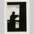 Silhouette of a man looking outside (ddr-densho-475-284)