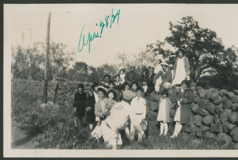 group photo near rock wall (ddr-densho-378-589)