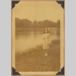 Grace poses by the water (ddr-densho-542-133)
