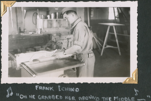 Man using table saw in shop (ddr-densho-434-334)