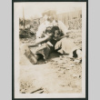 boy with two puppies (ddr-densho-378-365)