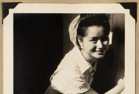 Chiyo smiling in a sunbeam (ddr-densho-542-570)