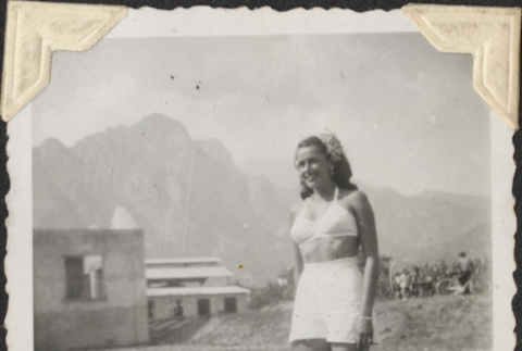 Woman in bathing suit with mountain in background (ddr-densho-466-902)