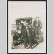 Family photo with car (ddr-densho-378-414)