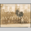 Men seated outside Seattle's Japanese Language School (ddr-densho-395-45)