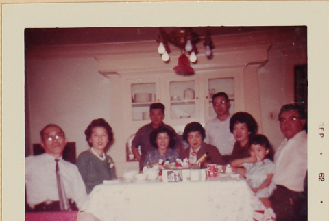 Group around dinner table (ddr-densho-522-572)