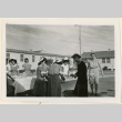 Serving tea at a hospital tea party (ddr-densho-37-1253)