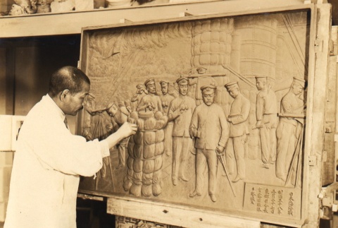 Uichiro Ogura working on a relief memorializing Heihachiro Togo (ddr-njpa-4-1737)