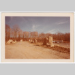 Rock pilars lining dirt road (ddr-densho-377-2173)