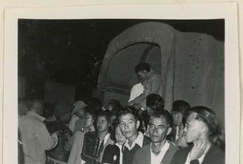 Crowd by a military truck (ddr-densho-37-895)