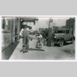 Toru and Susumu Miyoshi in front of Guadalupe General Merchandise Store (ddr-densho-480-154)