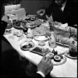 Table with various food and drink (ddr-densho-426-1705)