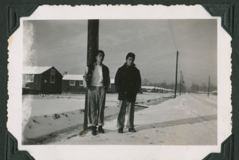 Two men standing in the snow (ddr-densho-471-89)