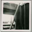 Board leaning on framing (ddr-densho-426-2252)