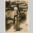 Woman standing in garden (ddr-densho-426-1568)