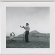 Larry Tajiri with two other men in a field (ddr-densho-338-298)