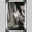 Photo of Paul and Kenji Ima holding a portrait (ddr-densho-483-1165)