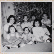 Shiomi siblings with other children by Christmas tree (ddr-densho-522-566)