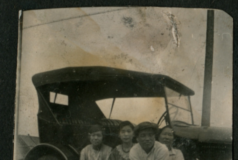 Young people pose with car (ddr-densho-359-793)