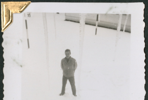 Man standing in snow, photo taken from above (ddr-densho-434-293)